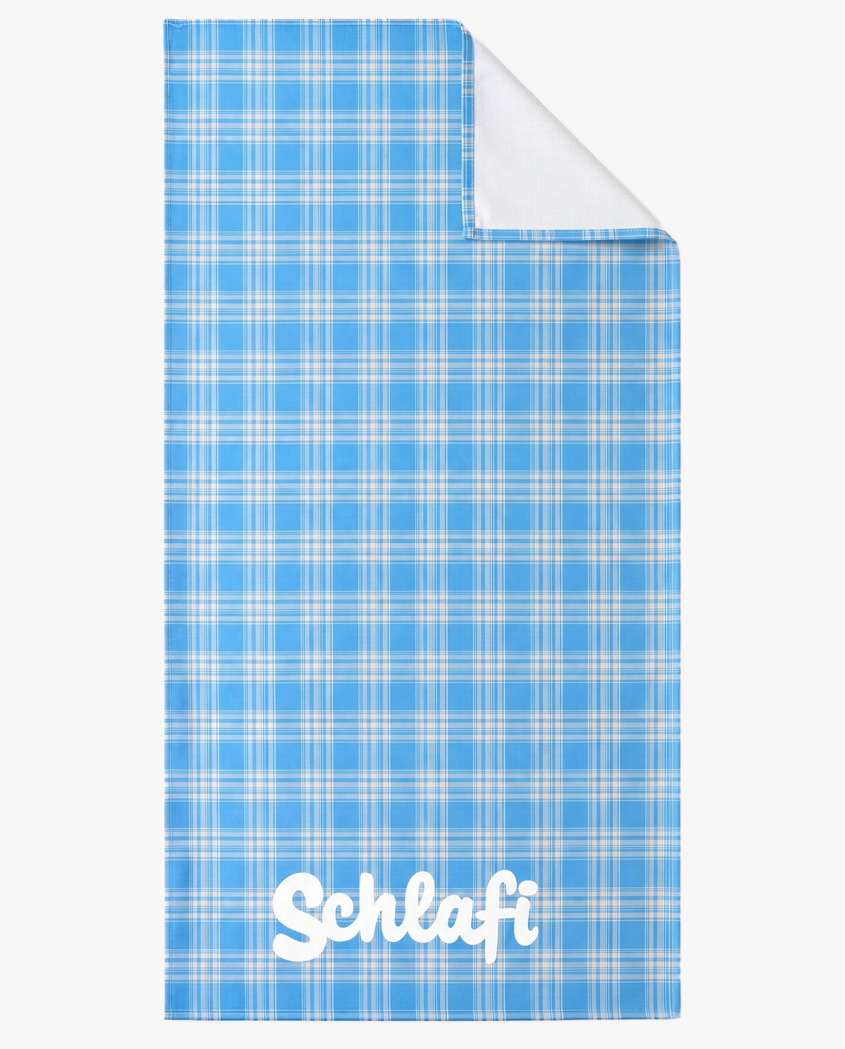 Blau kariertes Strandhandtuch mit weißer Rückseite und „Schlafi“-Schriftzug, teilweise umgeschlagen zur Darstellung der Materialstruktur.