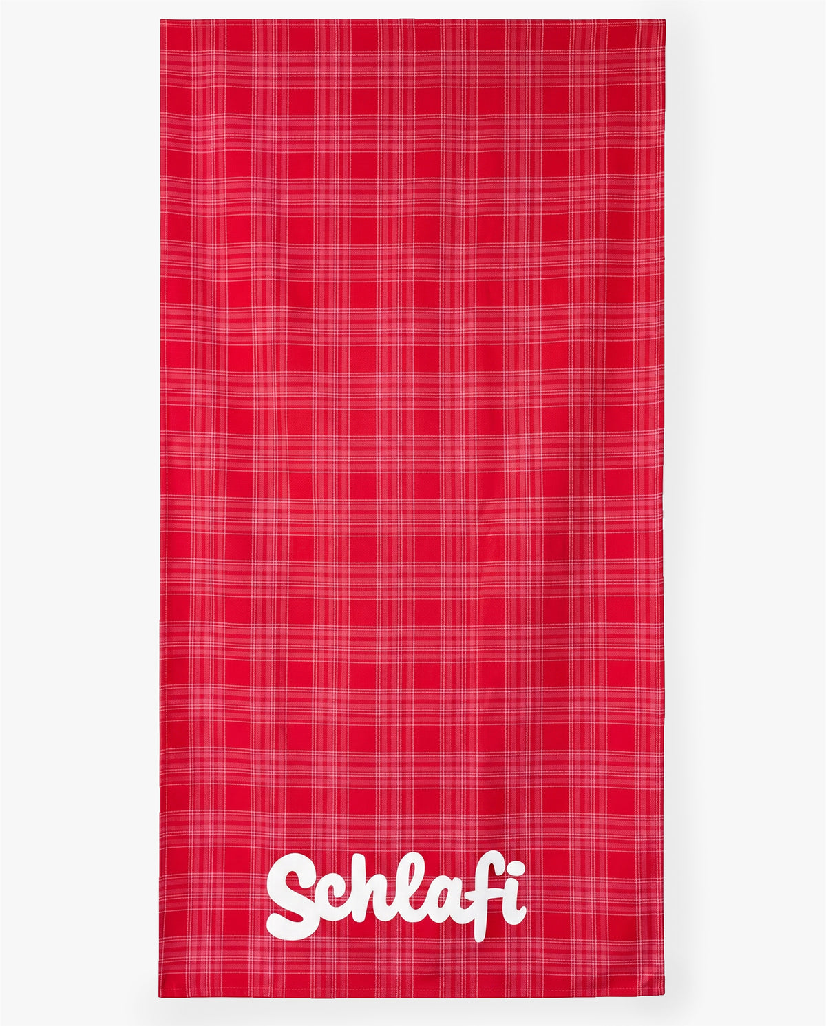 Rot kariertes Strandhandtuch mit weißer Rückseite und „Schlafi“-Schriftzug, teilweise umgeschlagen zur Darstellung der Materialstruktur.