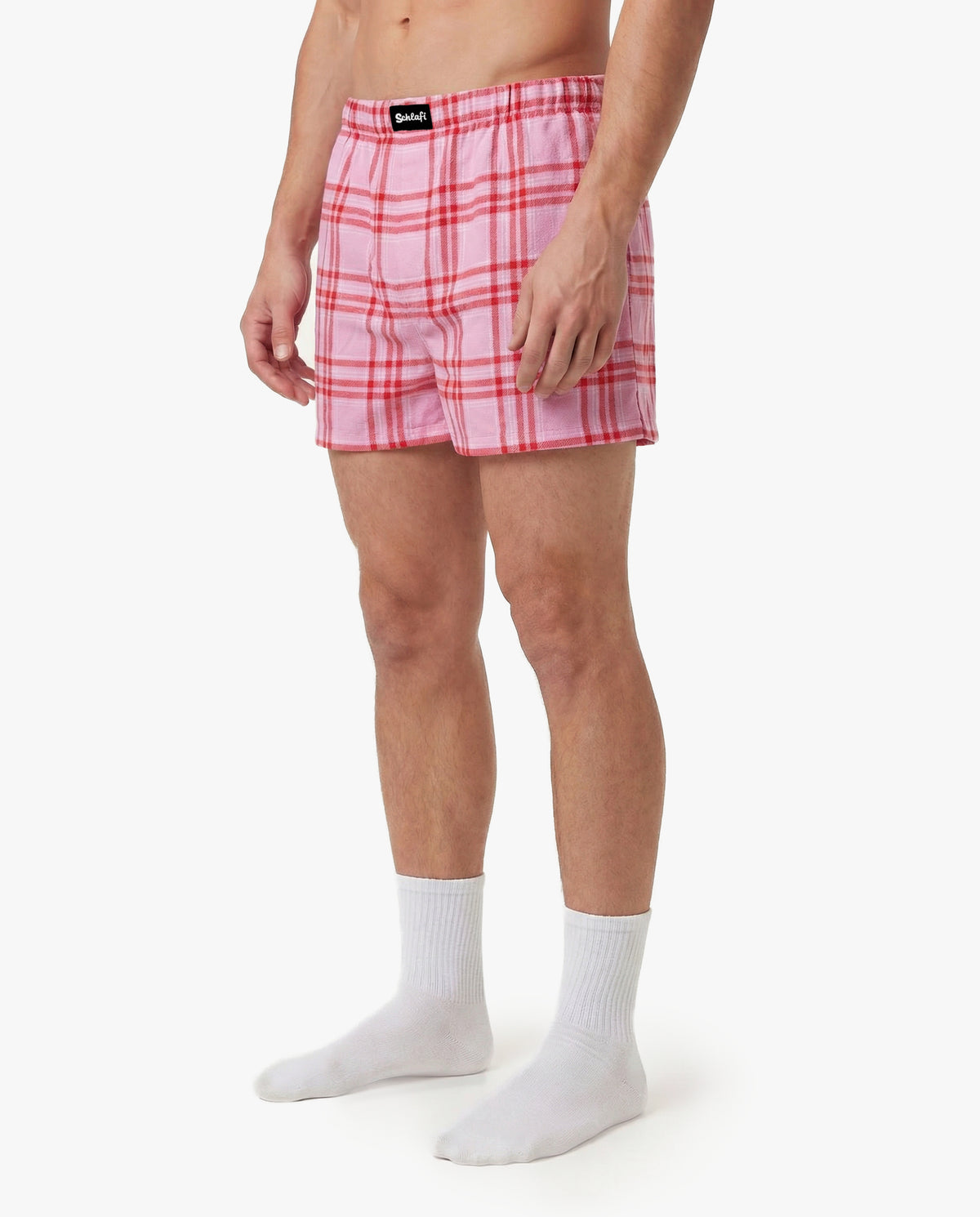 Schlafi Super Schorti in Dragonfruit –pink karierte Freizeithose für Herren mit lockerem Schnitt“.