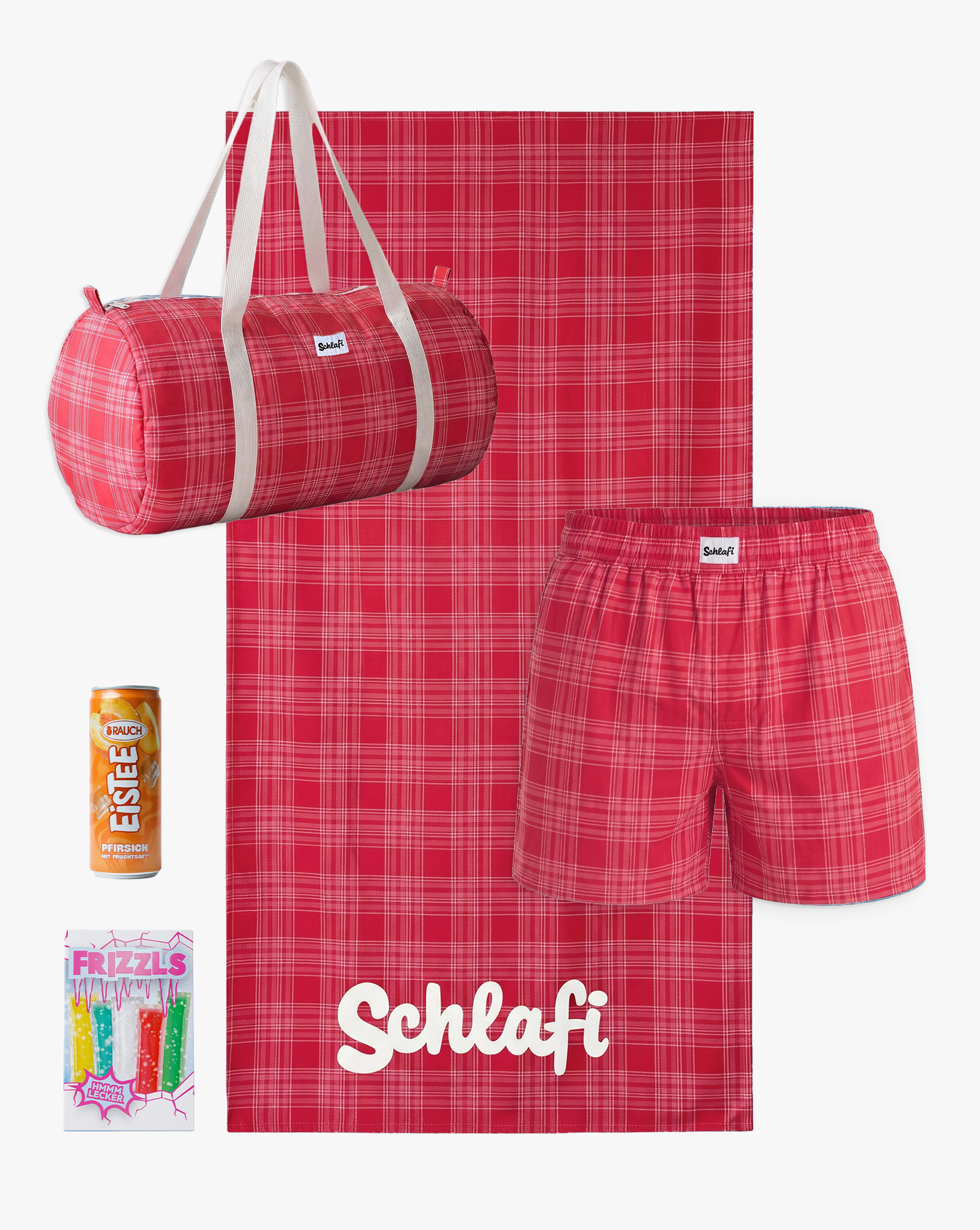 Schlafi Geschenkset in kräftigem Rot mit kariertem Muster, bestehend aus Reisetasche, Schlafshorts und Handtuch mit Logo-Aufdruck. Ergänzt wird das Set durch eine Dose Eistee und eine Packung Frucht-Eis am Stiel.